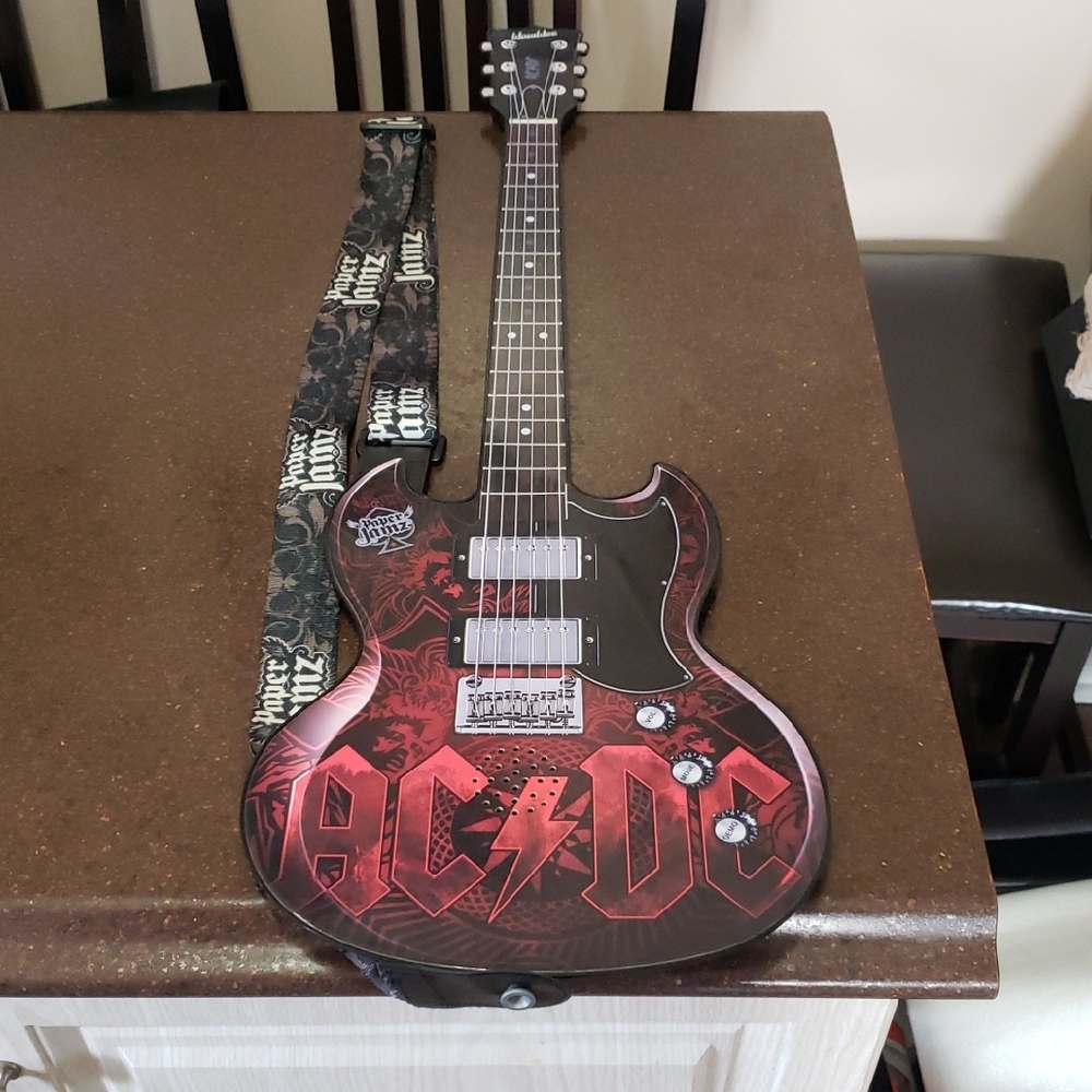 ACDC Paper Jamz Guitar by WowWee is a rare find from 2009.